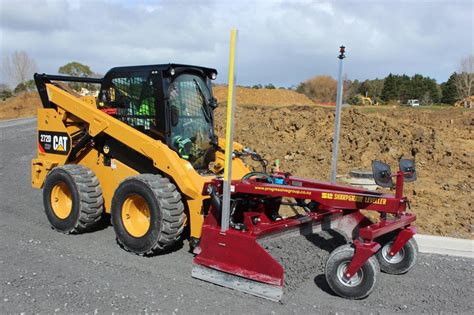 grading lawn with skid steer|grading attachments for skid steer.